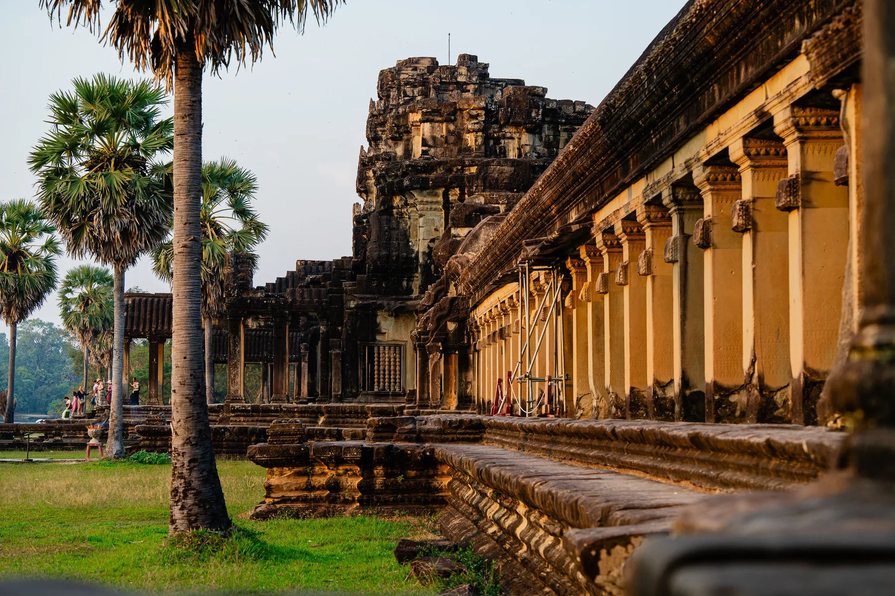 Warm evening light along the stone colonnade at Angkor Wat